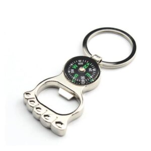 Chaveiro em formato de abridor de garrafa com bússola